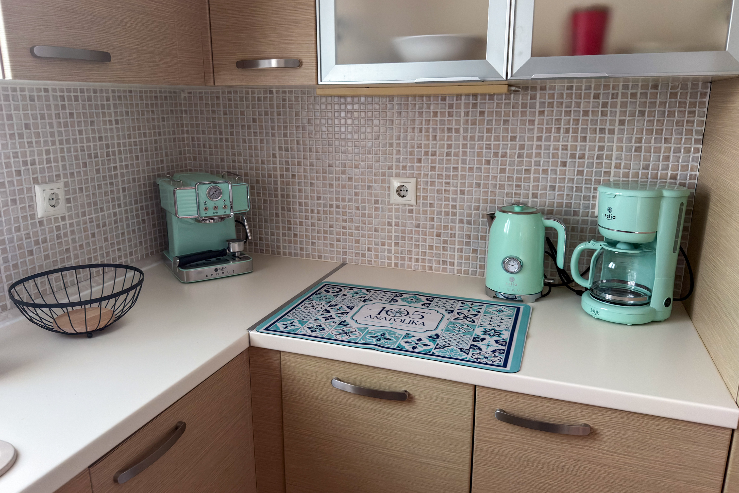Kitchen counter with mint retro appliances and 105 Anatolika tile mat